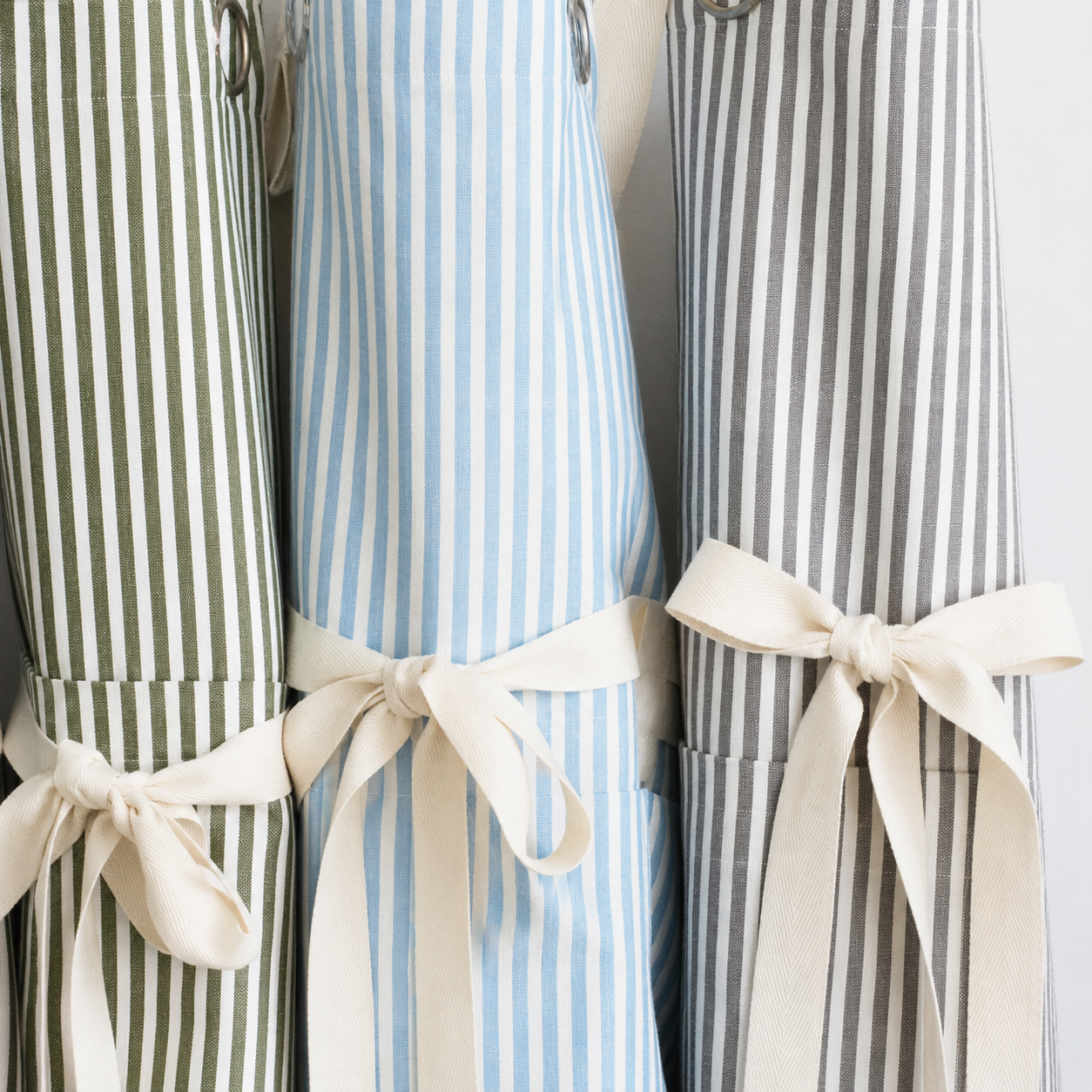 Ruffle Pin Stripe Apron: Tan